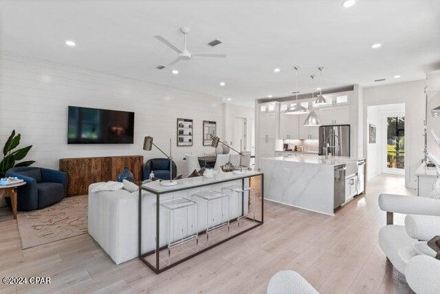 17 Woodland Dr, Santa Rosa Beach, FL 32459 - living room with visible vents, light wood-style floors, ceiling fan, and recessed lighting
