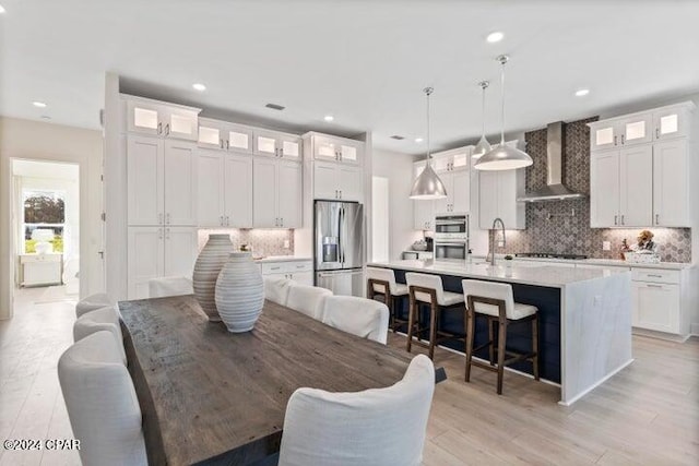17 Woodland Dr, Santa Rosa Beach, FL 32459 - dining room featuring light wood-style floors and recessed lighting