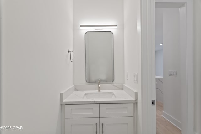 17 Woodland Dr, Santa Rosa Beach, FL 32459 - bathroom featuring wood finished floors and vanity