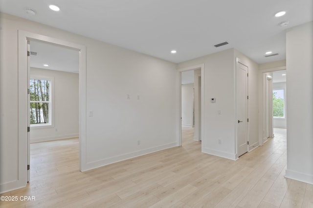 17 Woodland Dr, Santa Rosa Beach, FL 32459 - unfurnished room with baseboards, visible vents, light wood-style flooring, and recessed lighting