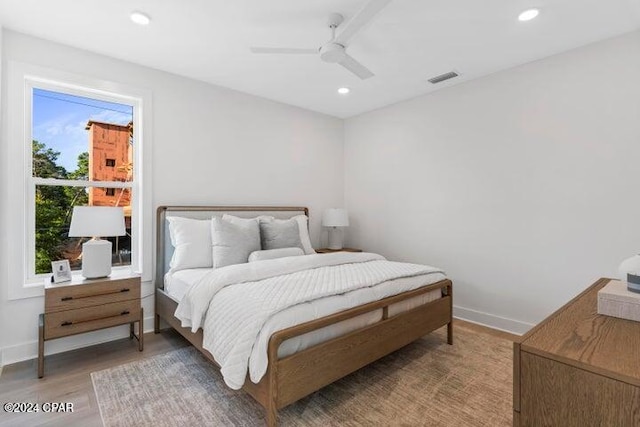 17 Woodland Dr, Santa Rosa Beach, FL 32459 - bedroom featuring baseboards, visible vents, recessed lighting, and wood finished floors