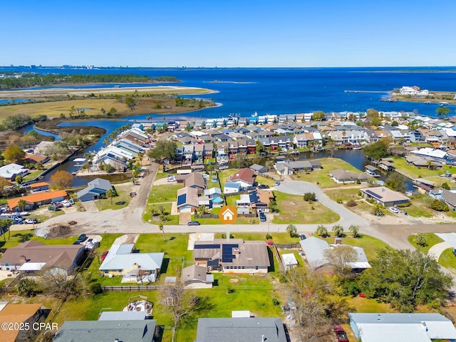bird's eye view with a residential view and a water view