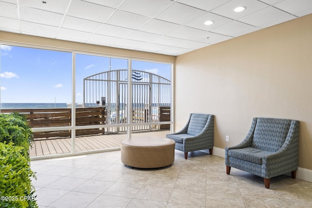 16819 Front Beach Rd Unit 2903, Panama City Beach, FL 32413 - interior space with baseboards, a drop ceiling, and tile patterned flooring