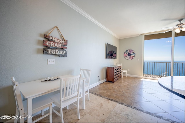 16819 Front Beach Rd Unit 2903, Panama City Beach, FL 32413 - dining area featuring a ceiling fan, light tile patterned floors, baseboards, crown molding, and expansive windows