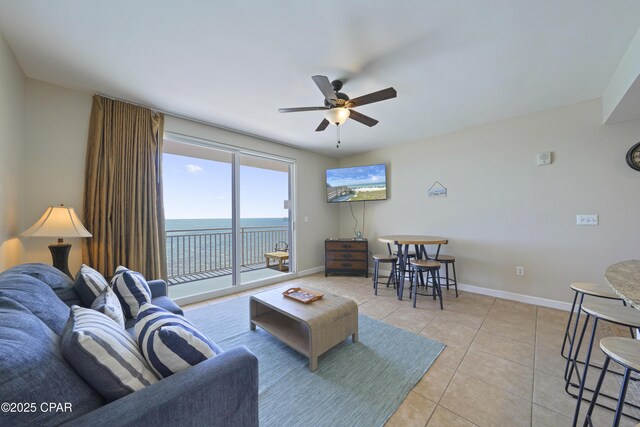 17739 Front Beach Rd Unit 1204W, Panama City Beach, FL 32413 - living room with ceiling fan and light tile patterned floors