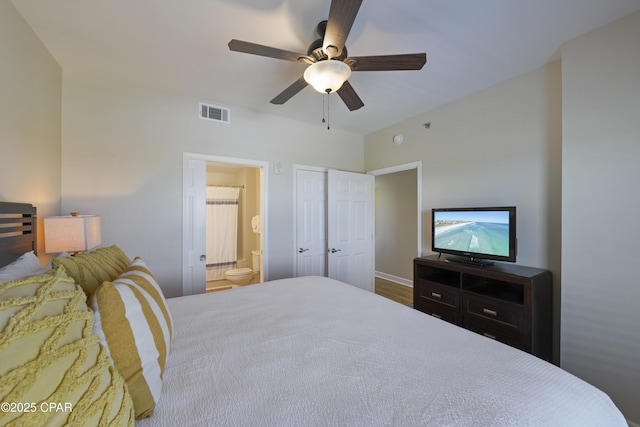 bedroom featuring ensuite bathroom and ceiling fan