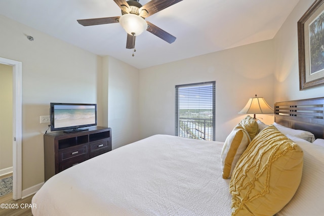 17739 Front Beach Rd Unit 1204W, Panama City Beach, FL 32413 - bedroom featuring ceiling fan and wood finished floors