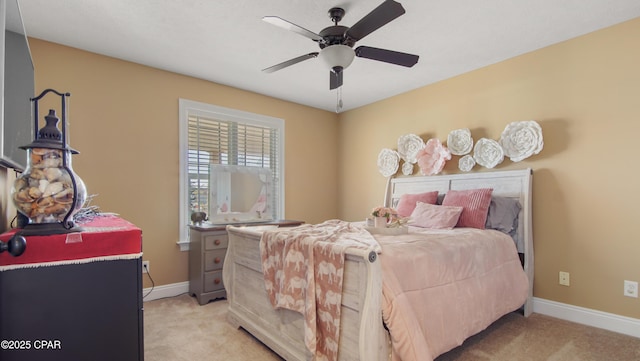 4439 Bylsma Cir, Panama City, FL 32404 - bedroom featuring light carpet, baseboards, and a ceiling fan