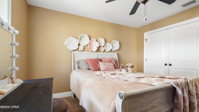 4439 Bylsma Cir, Panama City, FL 32404 - carpeted bedroom featuring a closet, baseboards, and a ceiling fan