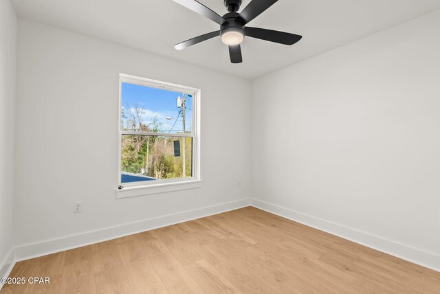 420 Lacosta Ave, Panama City, FL 32404 - unfurnished room featuring baseboards, light wood-style floors, and a ceiling fan