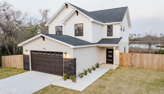420 Lacosta Ave, Panama City, FL 32404 - modern inspired farmhouse with board and batten siding, a front yard, fence, and roof with shingles