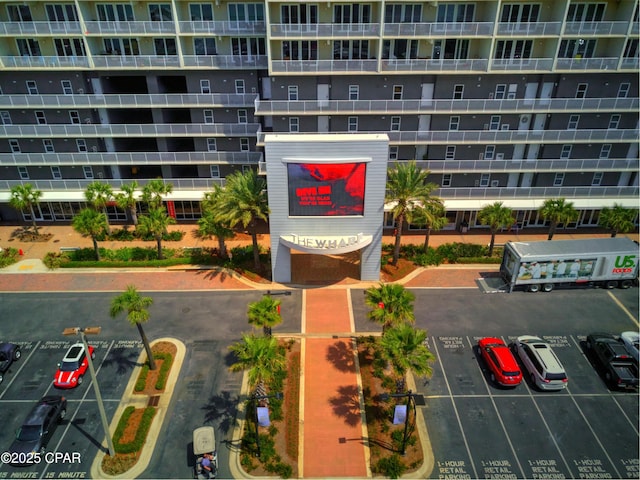 9860 S Thomas Dr Unit 2111, Panama City Beach, FL 32408 - view of apartment building / complex with uncovered parking
