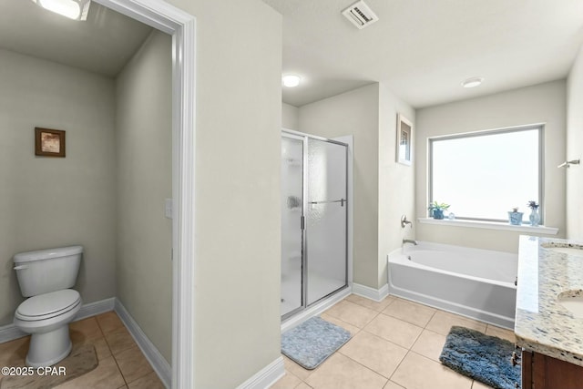 1527 Wateroak Dr, Lynn Haven, FL 32444 - full bathroom featuring tile patterned floors, a shower stall, toilet, a bath, and vanity