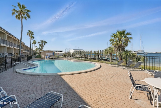 5505 Sun Harbor Rd Unit 143, Panama City, FL 32401 - community pool featuring a patio and fence