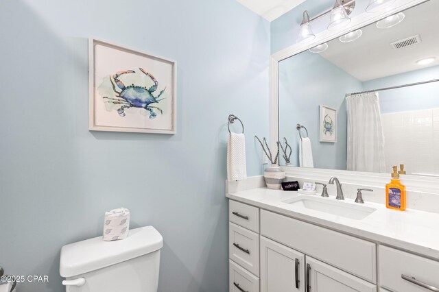 2501 Highway 98 C C, Mexico Beach, FL 32456 - bathroom with toilet, vanity, and a shower with shower curtain