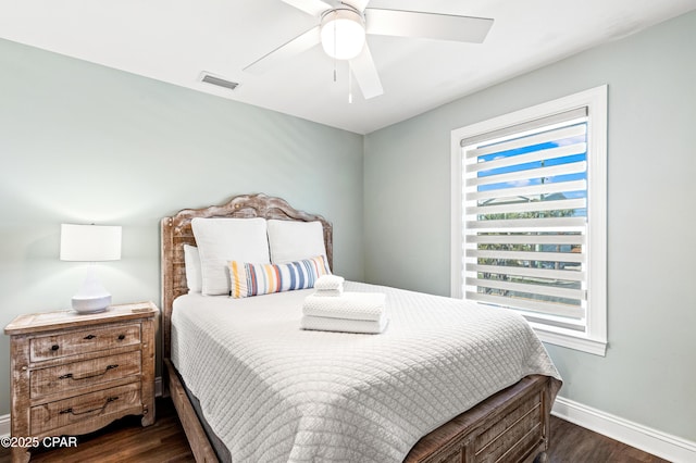 2501 Highway 98 C C, Mexico Beach, FL 32456 - bedroom with dark wood-style floors, baseboards, and a ceiling fan