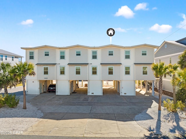 2501 Highway 98 C C, Mexico Beach, FL 32456 - back of property with concrete driveway and a carport