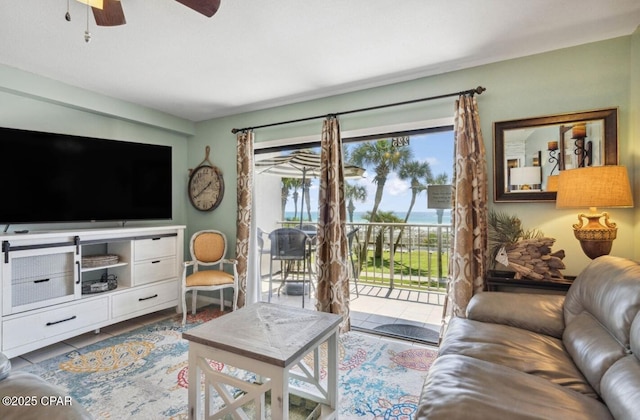 8743 Thomas Dr Unit 225, Panama City Beach, FL 32408 - living area with a ceiling fan