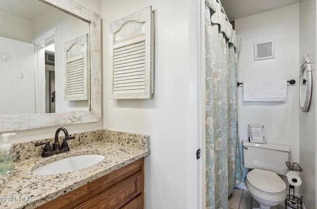 8743 Thomas Dr Unit 225, Panama City Beach, FL 32408 - bathroom featuring curtained shower, tile patterned flooring, visible vents, toilet, and vanity