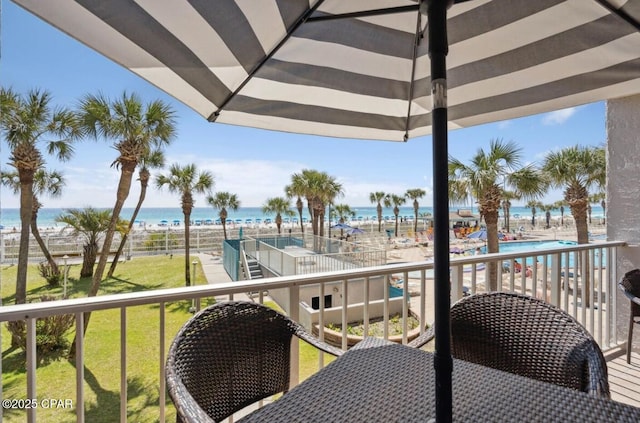 8743 Thomas Dr Unit 225, Panama City Beach, FL 32408 - balcony with a beach view and a water view