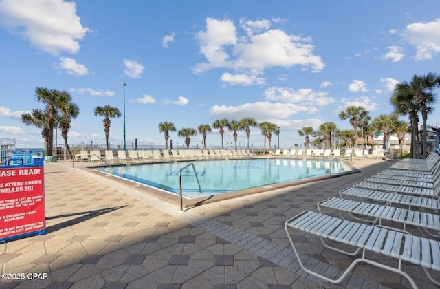 8743 Thomas Dr Unit 225, Panama City Beach, FL 32408 - pool with a patio area