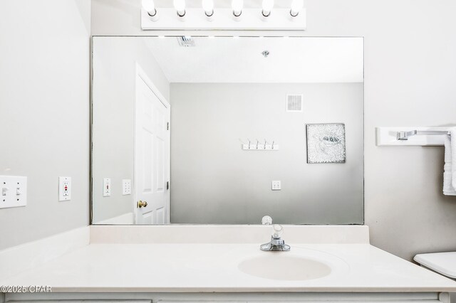 17462 Front Beach Rd Unit 56206, Panama City Beach, FL 32413 - bathroom with vanity and toilet