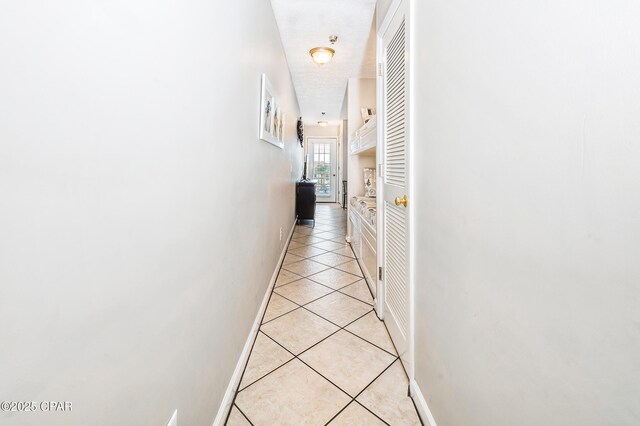 17462 Front Beach Rd Unit 56206, Panama City Beach, FL 32413 - corridor featuring light tile patterned floors and baseboards