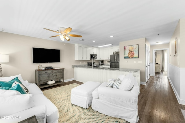 17690 Front Beach Rd Unit D307, Panama City Beach, FL 32413 - living area with wood finished floors, visible vents, baseboards, recessed lighting, and ceiling fan