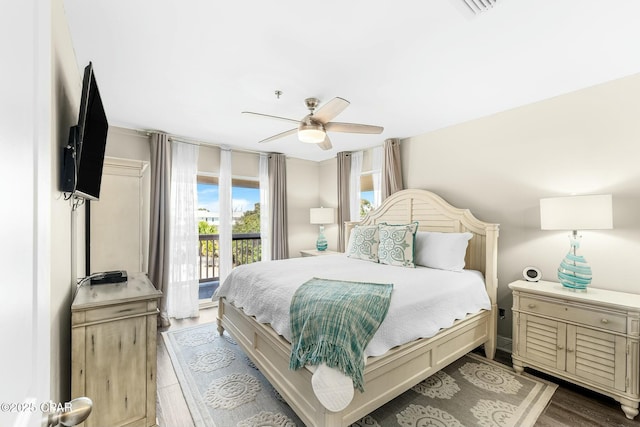17690 Front Beach Rd Unit D307, Panama City Beach, FL 32413 - bedroom featuring access to outside, wood finished floors, and ceiling fan