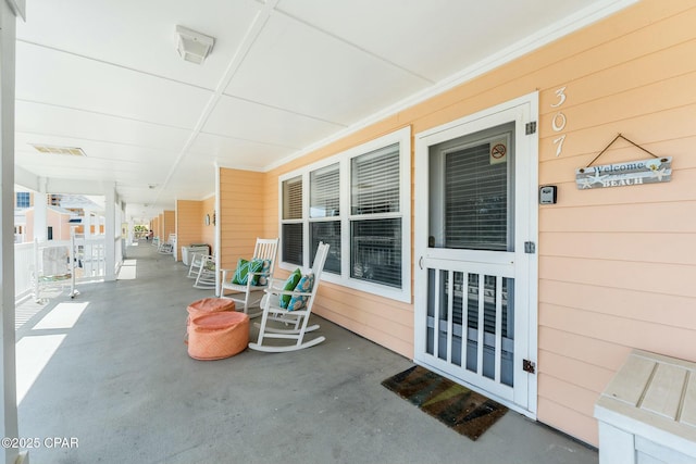 17690 Front Beach Rd Unit D307, Panama City Beach, FL 32413 - view of patio / terrace featuring visible vents and covered porch