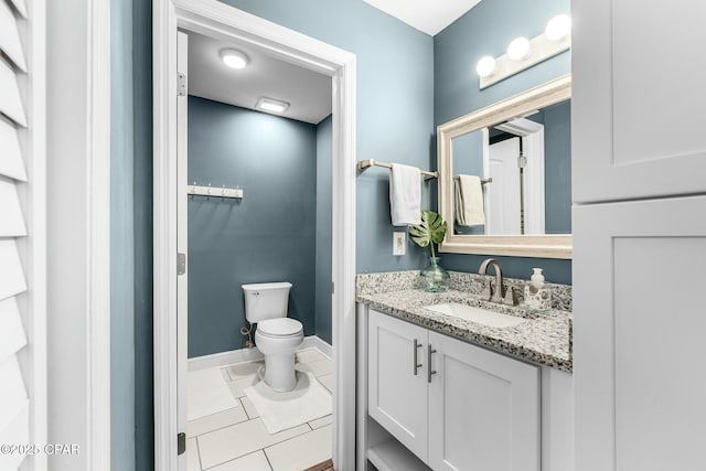 17690 Front Beach Rd Unit D307, Panama City Beach, FL 32413 - bathroom with vanity, tile patterned floors, toilet, and baseboards