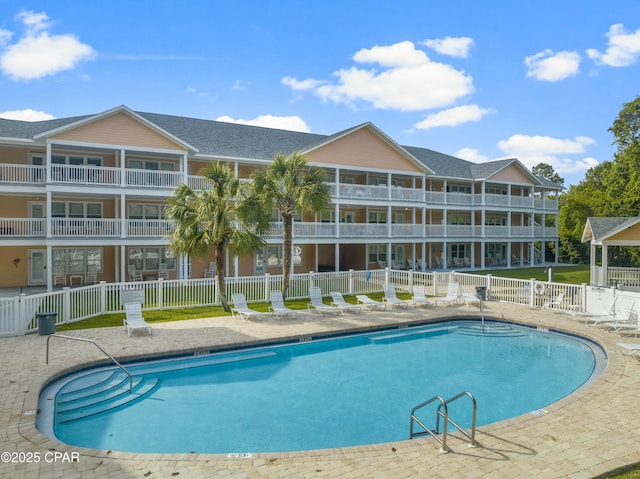 17690 Front Beach Rd Unit D307, Panama City Beach, FL 32413 - community pool with a patio and fence