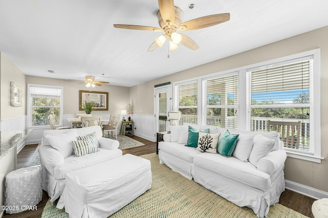 17690 Front Beach Rd Unit D307, Panama City Beach, FL 32413 - living area featuring visible vents, baseboards, a ceiling fan, and wood finished floors