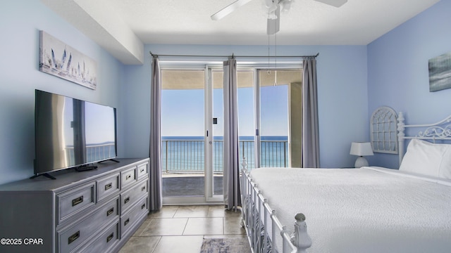 10519 Front Beach Rd Unit 1904B, Panama City Beach, FL 32407 - tiled bedroom featuring ceiling fan and access to exterior