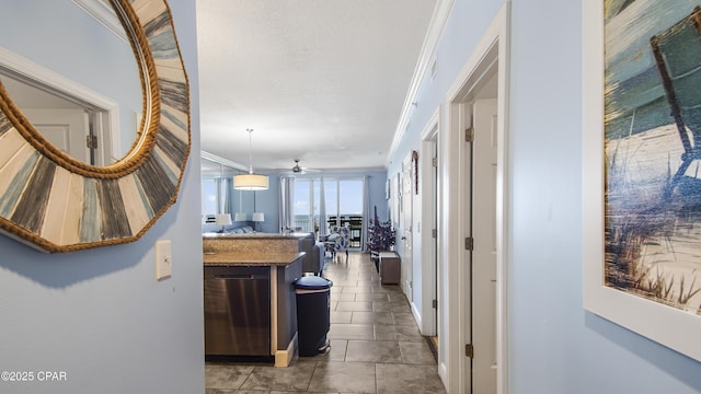10519 Front Beach Rd Unit 1904B, Panama City Beach, FL 32407 - corridor with tile patterned flooring, baseboards, and ornamental molding