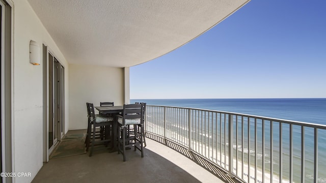 10519 Front Beach Rd Unit 1904B, Panama City Beach, FL 32407 - balcony with outdoor dining space, a view of the beach, and a water view