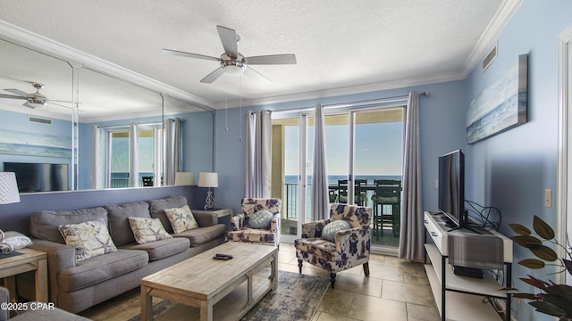 10519 Front Beach Rd Unit 1904B, Panama City Beach, FL 32407 - living room with ceiling fan, crown molding, a textured ceiling, and visible vents