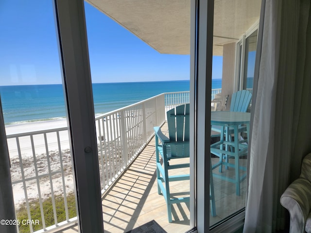 7205 Thomas Dr Unit E706, Panama City, FL 32408 - balcony featuring view of water and beach
