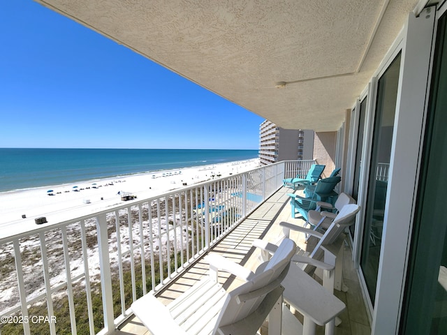 7205 Thomas Dr Unit E706, Panama City, FL 32408 - balcony with view of water and beach