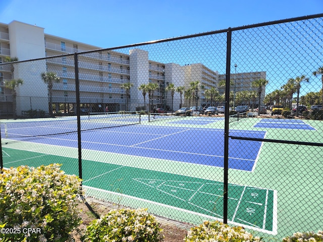 7205 Thomas Dr Unit E706, Panama City, FL 32408 - view of tennis court with fence
