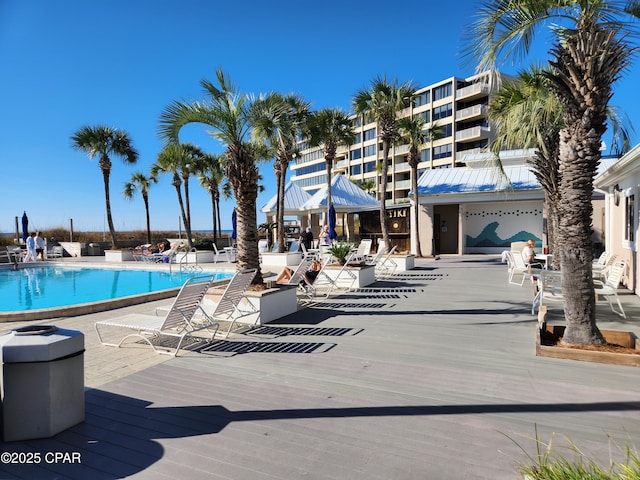 7205 Thomas Dr Unit E706, Panama City, FL 32408 - community pool featuring a patio area