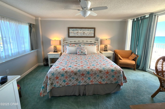 7205 Thomas Dr Unit E706, Panama City, FL 32408 - carpeted bedroom featuring crown molding, access to exterior, a textured ceiling, a ceiling fan, and baseboards