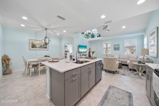 kitchen featuring visible vents, stainless steel dishwasher, a chandelier, a sink, and gray cabinetry