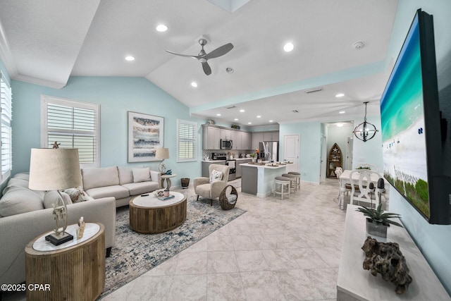 living room featuring recessed lighting, ceiling fan, visible vents, and lofted ceiling