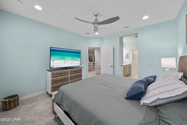bedroom featuring recessed lighting, baseboards, visible vents, and ensuite bathroom