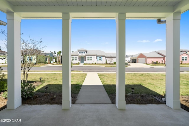 view of patio featuring a residential view and covered porch