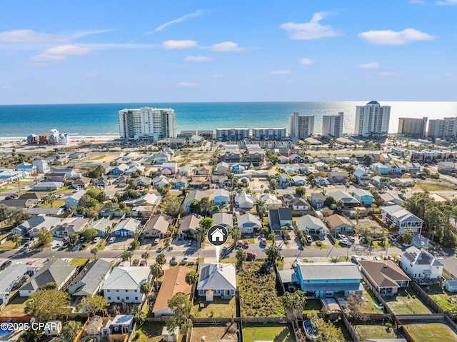 aerial view featuring a water view and a view of city
