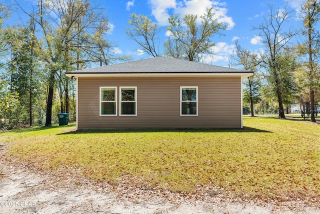 view of home's exterior featuring a lawn