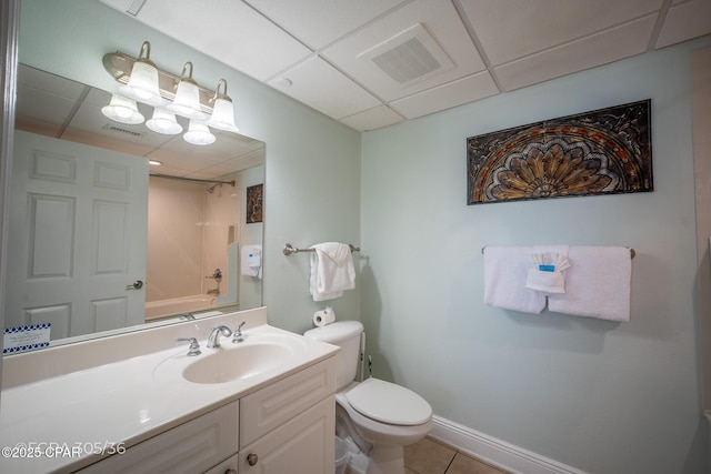 14701 Front Beach Rd Unit 1033, Panama City Beach, FL 32413 - bathroom with a paneled ceiling, toilet, vanity, tile patterned flooring, and  shower combination