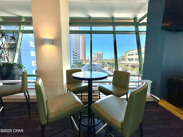 14701 Front Beach Rd Unit 1033, Panama City Beach, FL 32413 - dining area featuring a city view and wood finished floors